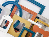 Color infused masterpiece of an eclectic gallery wall of picture frames in many styles and sizes in sets of 3, 5,7, 10, and 15
