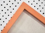 Bright and Playful Orange Framed Bulletin Board - Customizable Fabrics, Frames, and Sizes for Your Unique Style