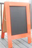 Large cheerful and functional bright orange sidewalk chalkboard sign for events, Vibrant restaurant easel sandwich sign with chalkboard 36 x 25 inches