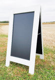 Charming distressed white sidewalk chalkboard sign with a reclaimed coastal feel, Boutique standing easel sandwich board 38x25 inches