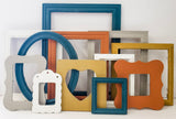 Color infused masterpiece of an eclectic gallery wall of picture frames in many styles and sizes in sets of 3, 5,7, 10, and 15