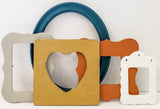 Color infused masterpiece of an eclectic gallery wall of picture frames in many styles and sizes in sets of 3, 5,7, 10, and 15