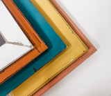 Captivating collection of mixed picture frames to curate a modern lake side cabin gallery wall in different sizes and styles.