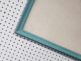 Serene lighter turquoise wall mounted bulletin with a neutral linen fabric, Available in Modern, Traditional, or Ornate Style of Frame and Small to Large Size, Agave