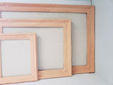 Fresh peach framed cork board for office, playroom, or girl's bedroom with a neutral linen fabric, Available in Modern, Traditional, or Ornate Frame Style in small to large sizes.