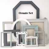 A mix and match set of vintage, shades of gray picture frames for a gallery wall, Assorted grey ombre photo frame wall collage for family memories