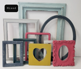 Casual Light and Moody Different Sized Photo Frames for an Eclectic Gallery Wall with Cool Tones