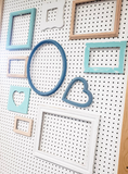 Serene coastal mismatched, decorative wall frames with a beachy vibe for an eclectic gallery wall