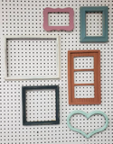 Assorted stylish earthy, desert inspired fun frames for picture montage, Cool eclectic grouping of standard size photo frame, Salvador