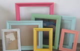 Fun Wall Collage with a Mix of Rainbow Colors for a Cheerful, Eclectic Kids Artwork Display