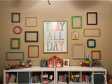 Fun Wall Collage with a Mix of Rainbow Colors for a Cheerful, Eclectic Kids Artwork Display